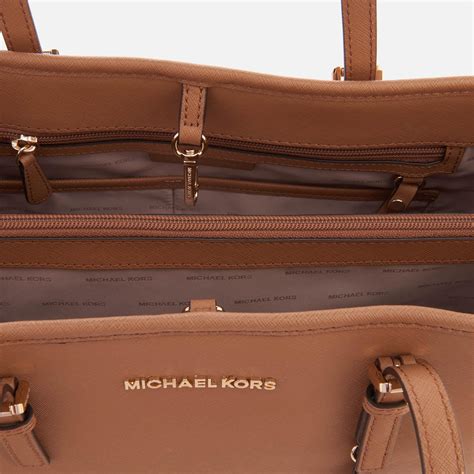 michael michael kors jet set travel md ew tote|michael kors packable tote.